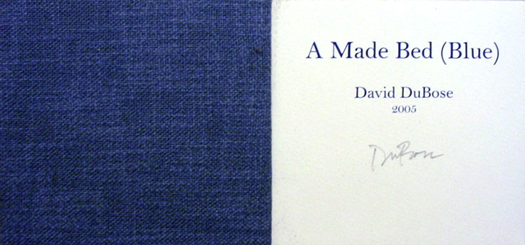 a made bed cover and title page